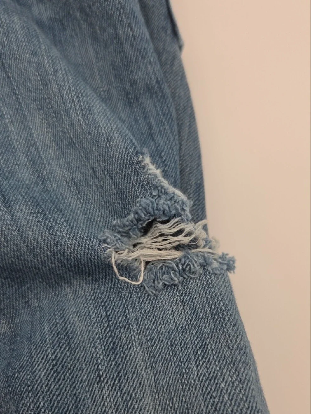 GAP denim garment in classic blue with contrast stitching